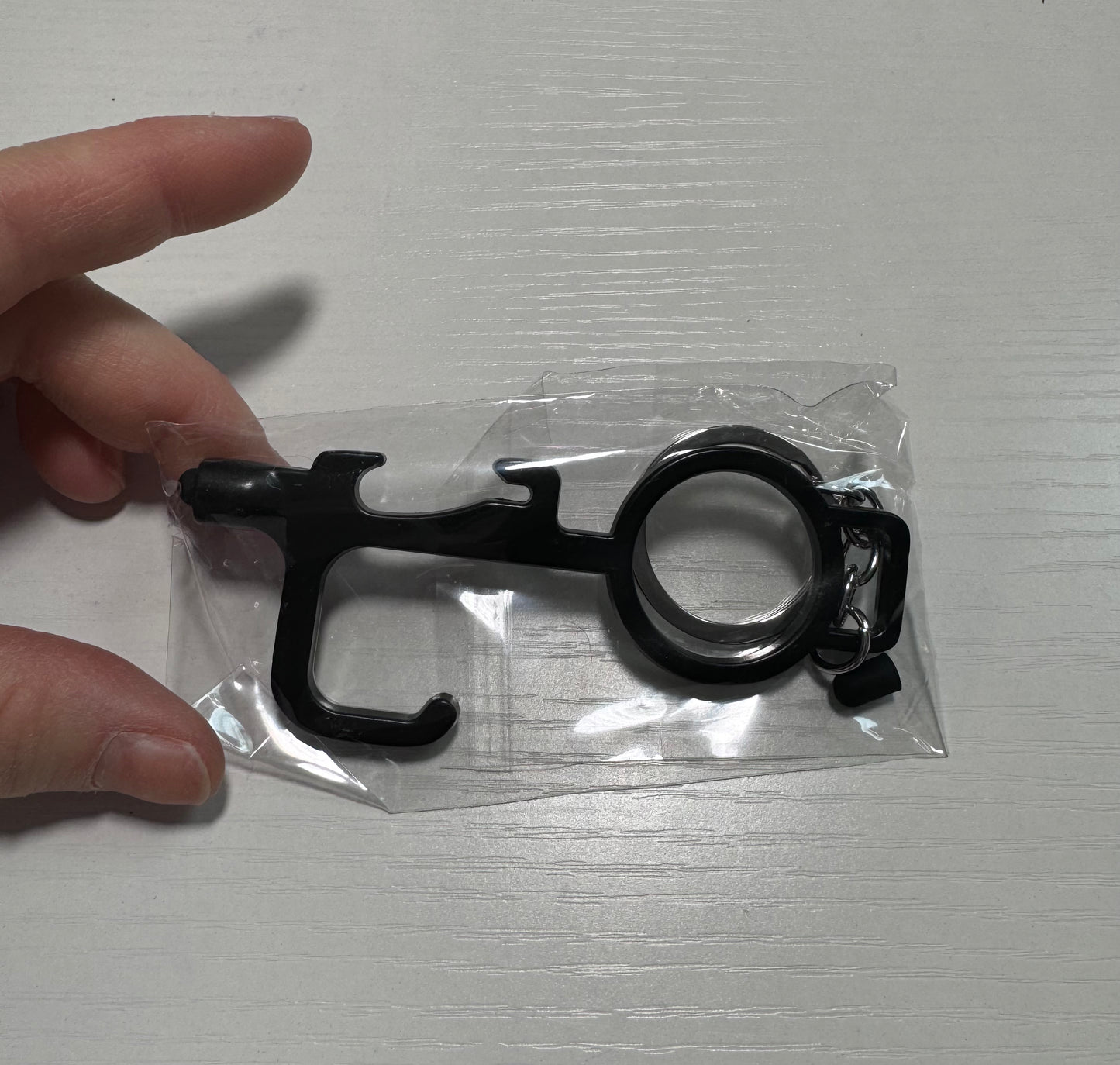 Anti-touch door handle opener/touch screen tip